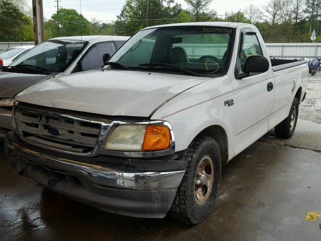 2FTRF17264CA39953 - 2004 FORD F-150 HERI WHITE photo 2