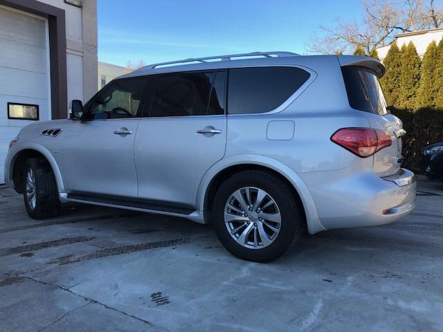 JN8AZ2NF2G9612049 - 2016 INFINITI QX80 SILVER photo 4