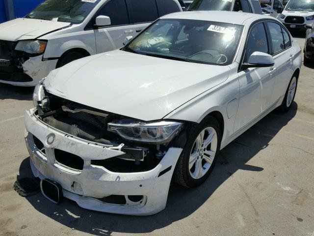 WBA8E1C56GK479702 - 2016 BMW 330E Ақ фото 2