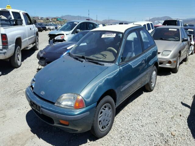 2C1MR229XV6729844 - 1997 GEO METRO GREEN photo 2