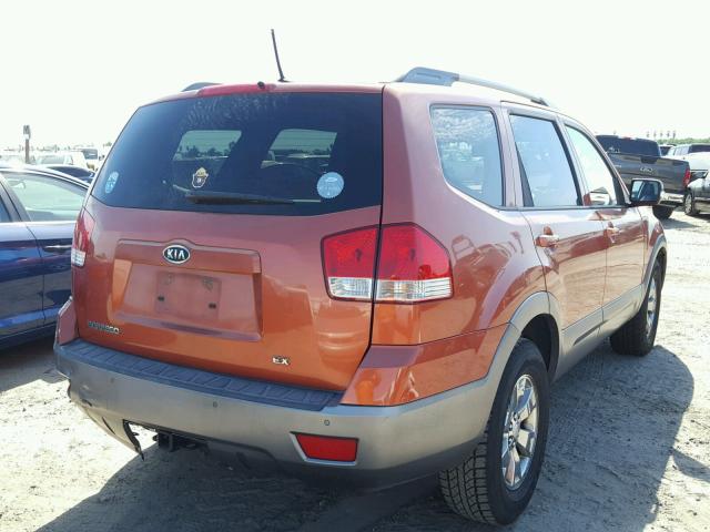 KNDJJ741295019758 - 2009 KIA BORREGO LX ORANGE photo 4