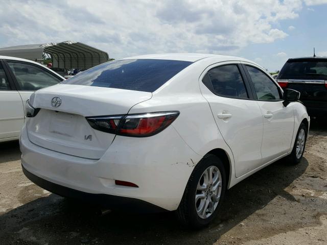 3MYDLBZV5GY107730 - 2016 TOYOTA SCION IA WHITE photo 4