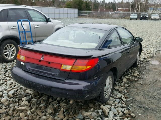 1G8ZR1277XZ327427 - 1999 SATURN SC2 BLACK photo 4