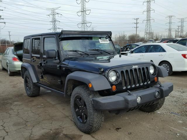 1C4BJWDG1CL241889 - 2012 JEEP WRANGLER U BLACK photo 1