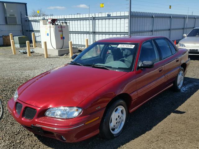 1G2NE52M2VM556660 - 1997 PONTIAC GRAND AM S Tünd qırmızı foto 2