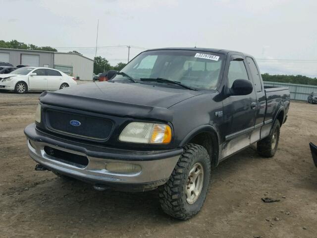 1FTDX186XVKB09461 - 1997 FORD F150 BLACK photo 2