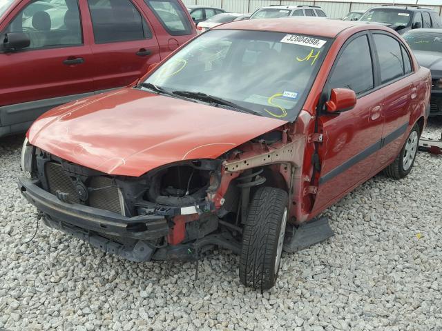 KNADE123766171699 - 2006 KIA RIO RED photo 2