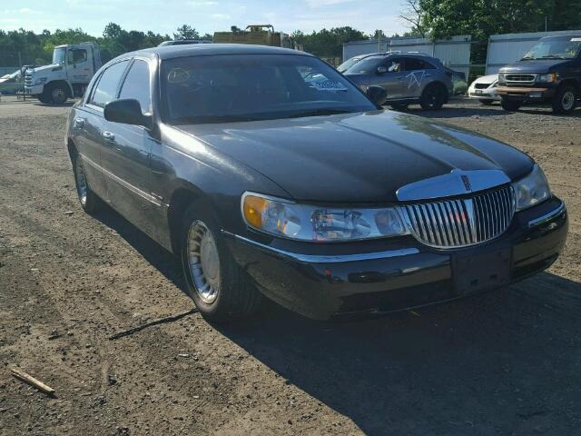 1LNHM81W4YY899009 - 2000 LINCOLN TOWN CAR E BLACK photo 1