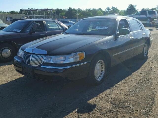 1LNHM81W4YY899009 - 2000 LINCOLN TOWN CAR E BLACK photo 2