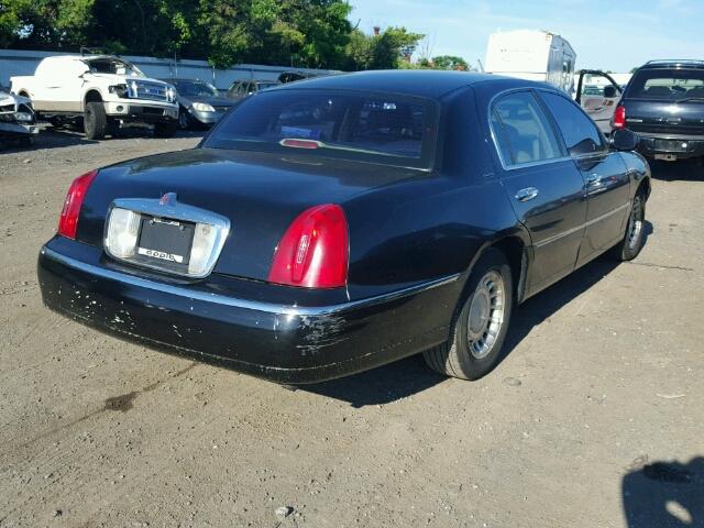 1LNHM81W4YY899009 - 2000 LINCOLN TOWN CAR E BLACK photo 4