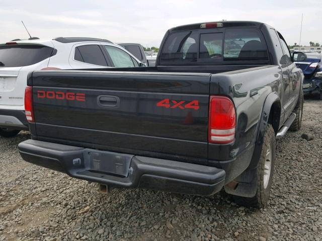 1B7GG22X2XS144860 - 1999 DODGE DAKOTA BLACK photo 4