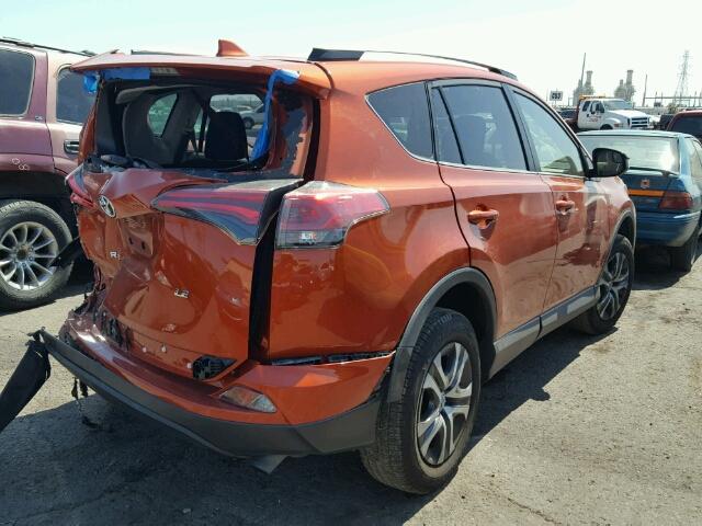 JTMZFREV4GJ070099 - 2016 TOYOTA RAV4 LE ORANGE photo 4