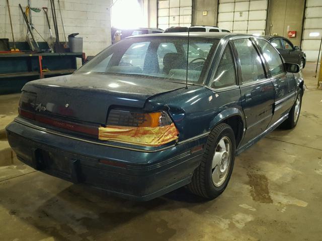 1G2WJ52M6SF204407 - 1995 PONTIAC GRAND PRIX GREEN photo 4