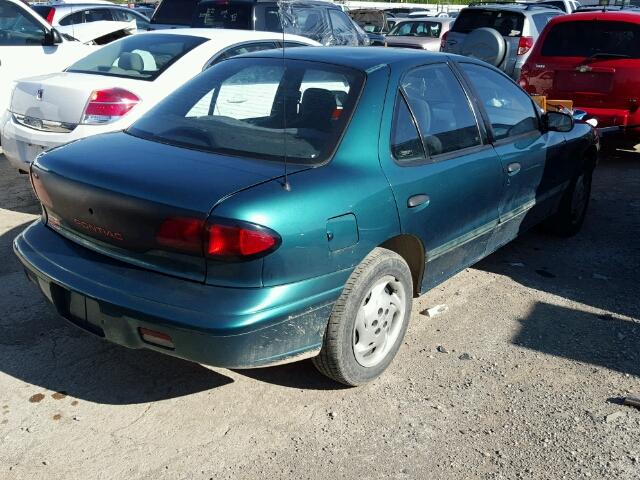 1G2JB52T1V7579392 - 1997 PONTIAC SUNFIRE SE GREEN photo 4