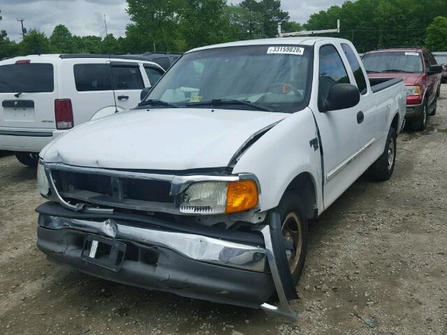 2FTRX17W54CA89503 - 2004 FORD F-150 HERI WHITE photo 2