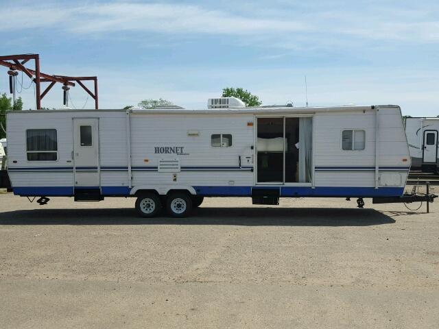 4VDT35F2737307880 - 2003 KEYSTONE HORNET WHITE photo 1