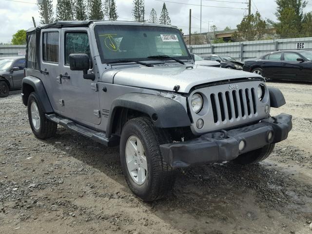 1C4BJWDG1EL100338 - 2014 JEEP WRANGLER U GRAY photo 1