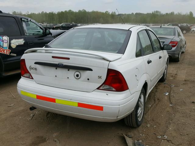 1FAFP34344W170981 - 2004 FORD FOCUS SE C WHITE photo 4