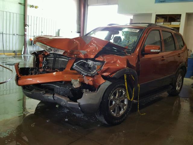 KNDJH741X95016697 - 2009 KIA BORREGO LX ORANGE photo 2