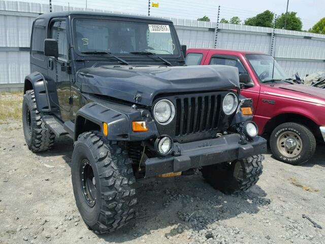 1J4FA49S4YP734012 - 2000 JEEP WRANGLER / BLACK photo 1