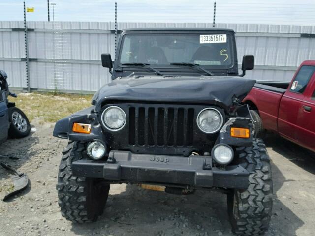 1J4FA49S4YP734012 - 2000 JEEP WRANGLER / BLACK photo 7