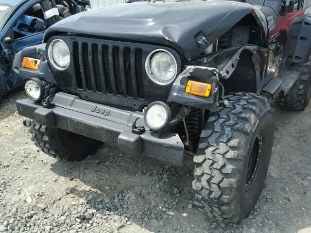 1J4FA49S4YP734012 - 2000 JEEP WRANGLER / BLACK photo 9