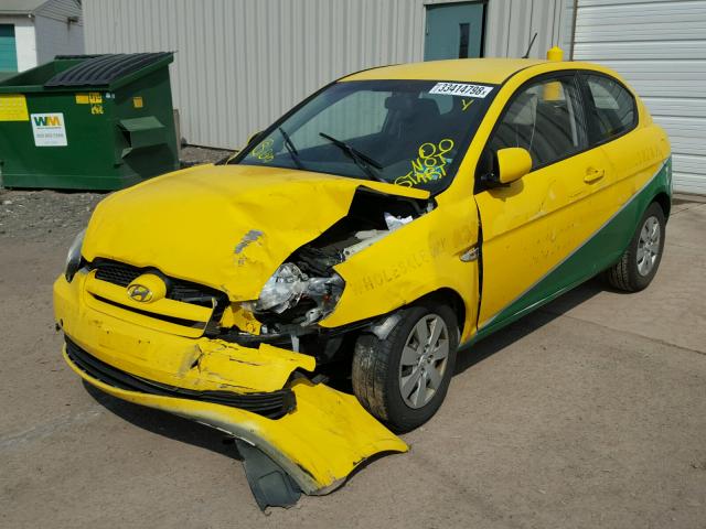 KMHCM3ACXAU167449 - 2010 HYUNDAI ACCENT BLU YELLOW photo 2