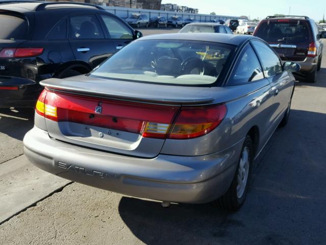 1G8ZR1277XZ205411 - 1999 SATURN SC2 CHARCOAL photo 4