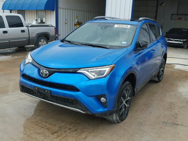 2T3NFREV7HW332473 - 2017 TOYOTA RAV4 SE BLUE photo 2