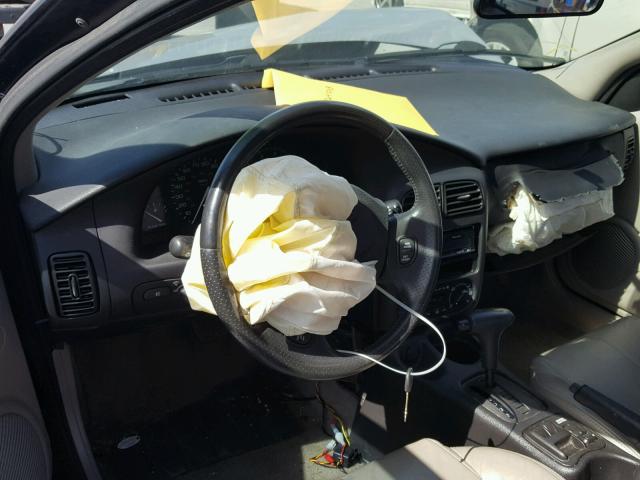 1G8ZY1274YZ194694 - 2000 SATURN SC2 SILVER photo 9