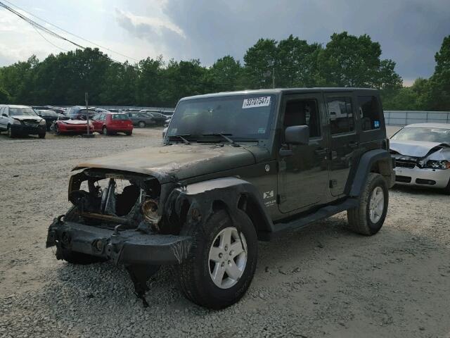 1J4GA391X8L582265 - 2008 JEEP WRANGLER U GREEN photo 2