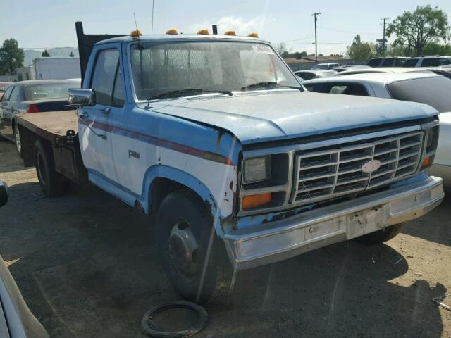 2FDJF37L2ECB16817 - 1984 FORD F350 BLUE photo 1