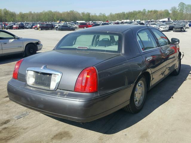 1LNHM82WXXY690726 - 1999 LINCOLN TOWN CAR S GRAY photo 4