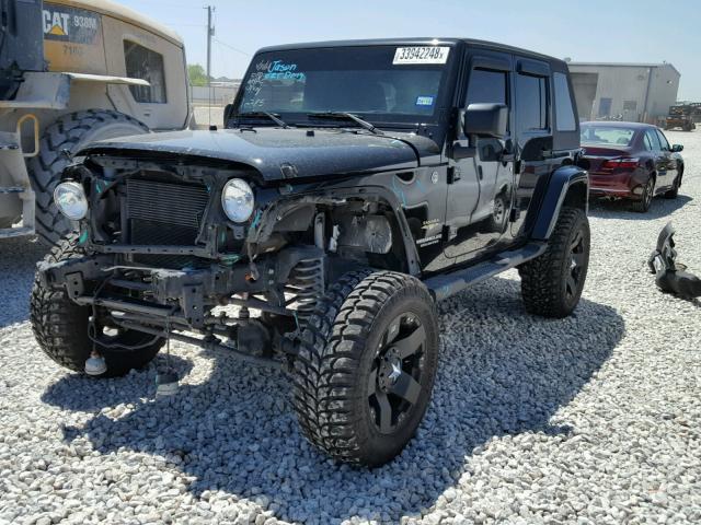 1C4HJWEGXEL285997 - 2014 JEEP WRANGLER U BLACK photo 2