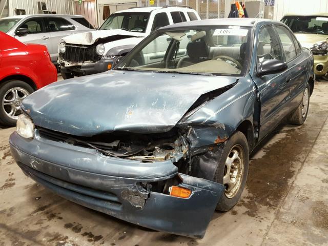 1Y1SK5263SZ087906 - 1995 GEO PRIZM BASE ლურჯი ფოტო 2