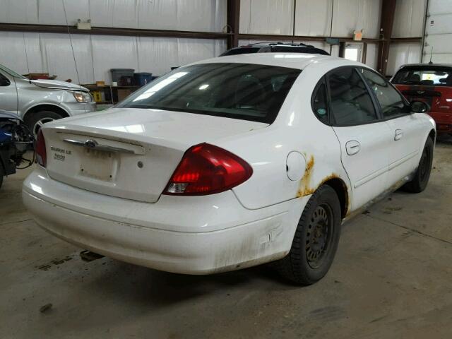 1FAFP52U2YG265837 - 2000 FORD TAURUS LX WHITE photo 4