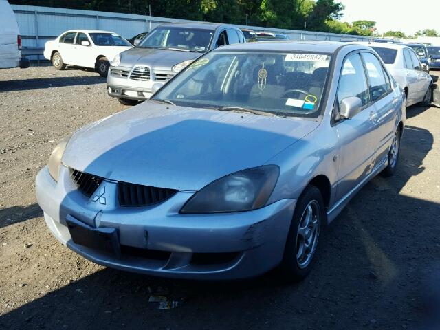 JA3AJ86EX4U018876 - 2004 MITSUBISHI LANCER OZ SILVER photo 2