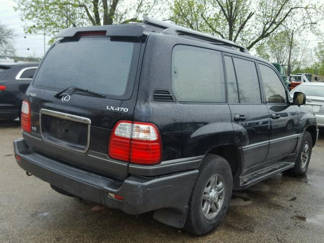 JTJHT00W323519993 - 2002 LEXUS LX 470 BLACK photo 4