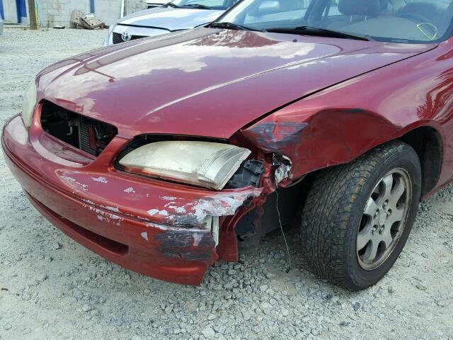 1YVGF22D9X5856493 - 1999 MAZDA 626 ES RED photo 9