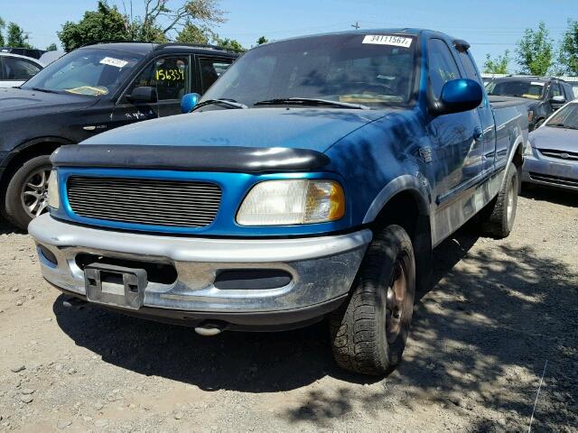 2FTZX18W7WCA55533 - 1998 FORD F150 GREEN photo 2