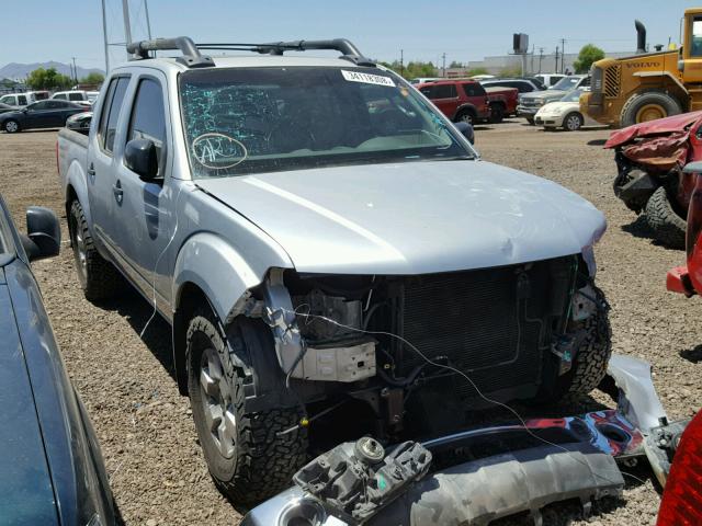 1N6AD07U25C411663 - 2005 NISSAN FRONTIER C SILVER photo 1