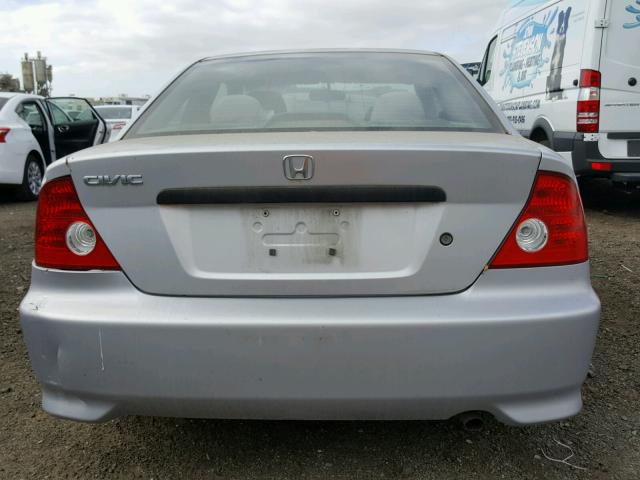 1HGEM21195L040906 - 2005 HONDA CIVIC DX V SILVER photo 9