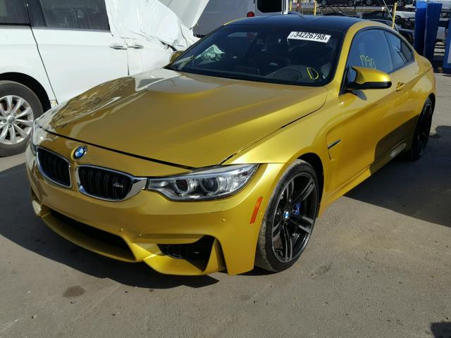 WBS3R9C56GK338301 - 2016 BMW M4 YELLOW photo 2