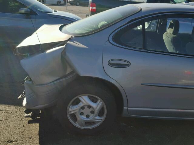 1G2WJ52M4XF338999 - 1999 PONTIAC GRAND PRIX SILVER photo 10