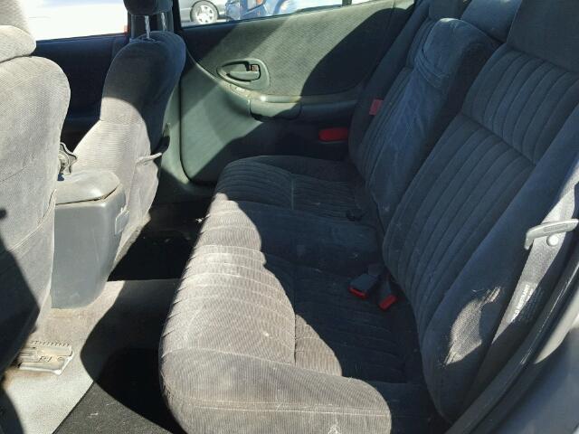 1G2WJ52M4XF338999 - 1999 PONTIAC GRAND PRIX SILVER photo 6