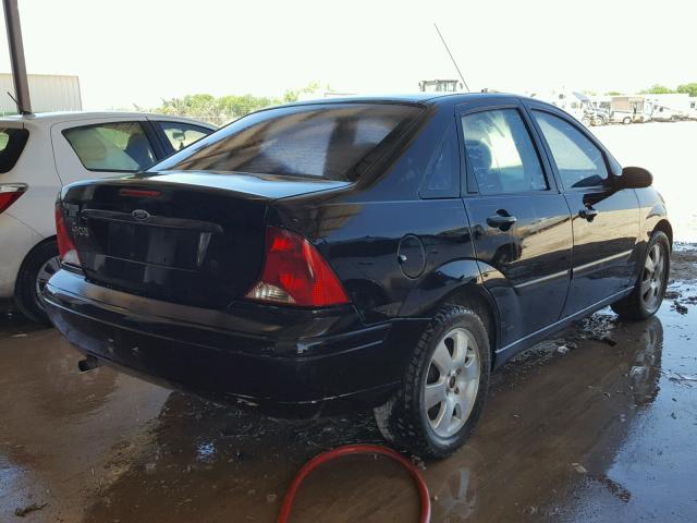 1FAFP33P24W190554 - 2004 FORD FOCUS LX BLACK photo 4