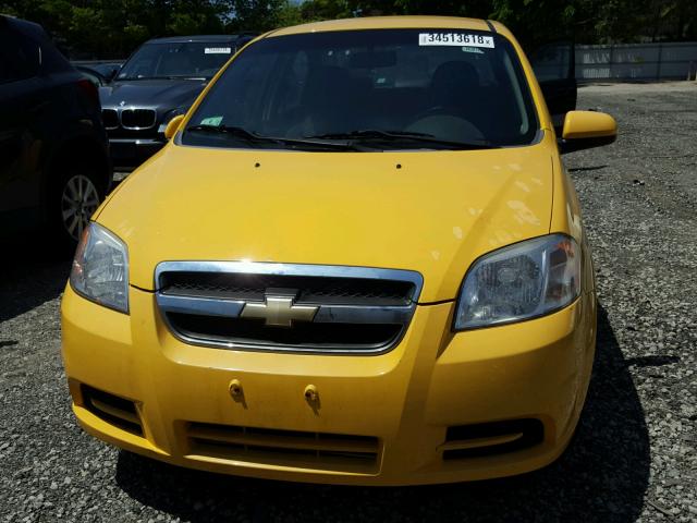 KL1TD5DEXBB138244 - 2011 CHEVROLET AVEO LS YELLOW photo 9