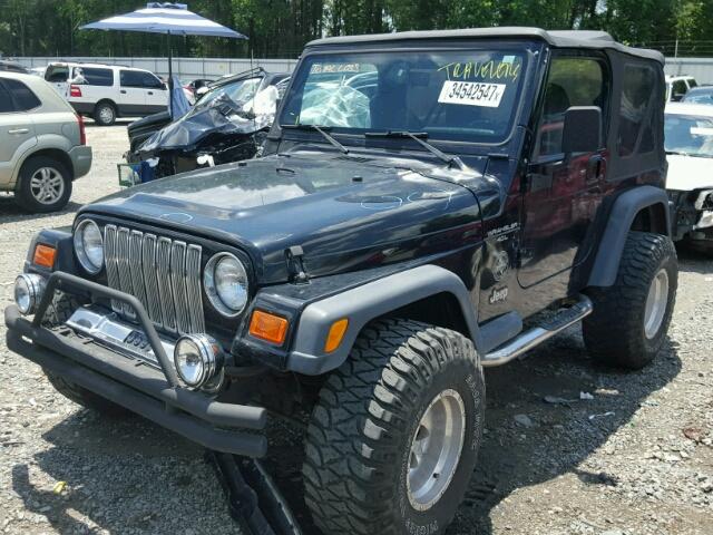 1J4FA49S1YP722819 - 2000 JEEP WRANGLER / BLACK photo 2