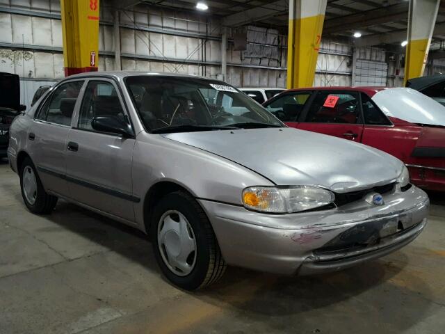 1Y1SK5289YZ438621 - 2000 CHEVROLET GEO PRIZM GRAY photo 1