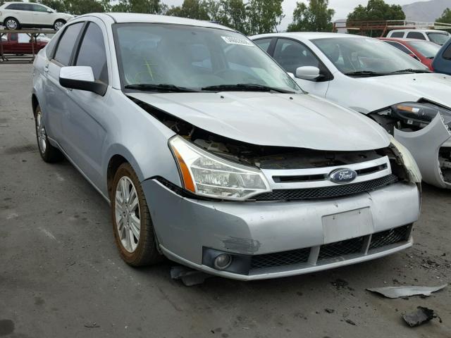 1FAHP3HN0BW150535 - 2011 FORD FOCUS SEL SILVER photo 1